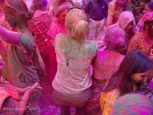 dancing and celebrating in holi, india