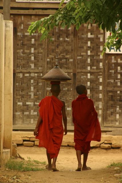 monks-with-alms-Myanmar-Bagan young monks walking at bagan