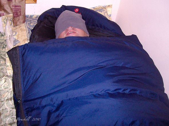 sleeping-everest-trek-cold Trekker in sleeping bag on Everest Base Camp Trek