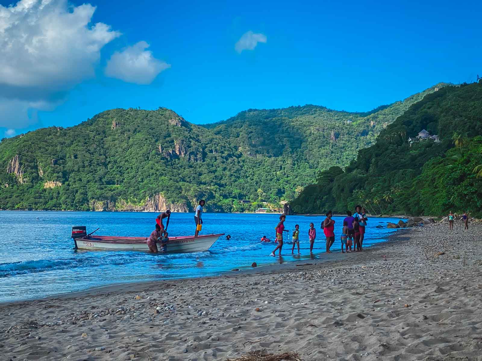 Travellers enjoying beautiful beaches in Saint Lucia.