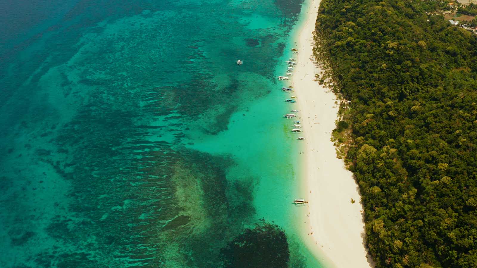 Best Beaches in the World Saud Beach Philippines