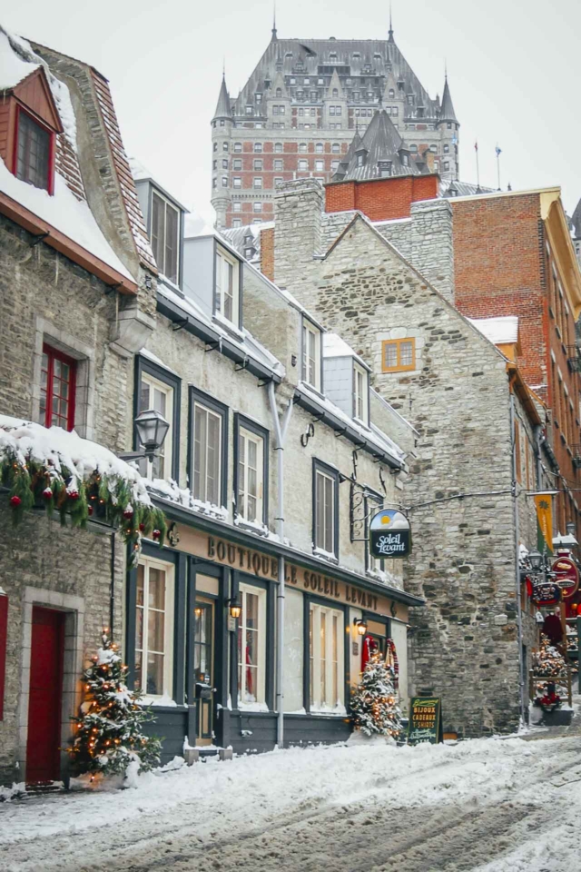 old quebec city in winter with chateau frontenac in background