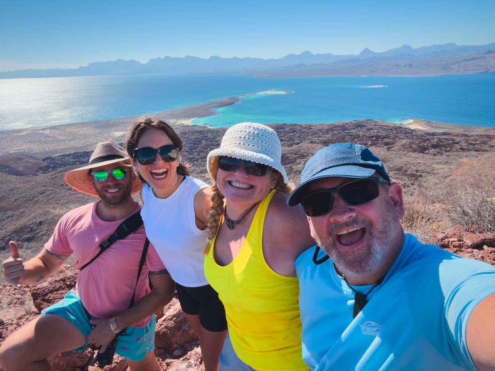 Celebrating at the summit of the volcano on Coronado Island in Loreto Mexico