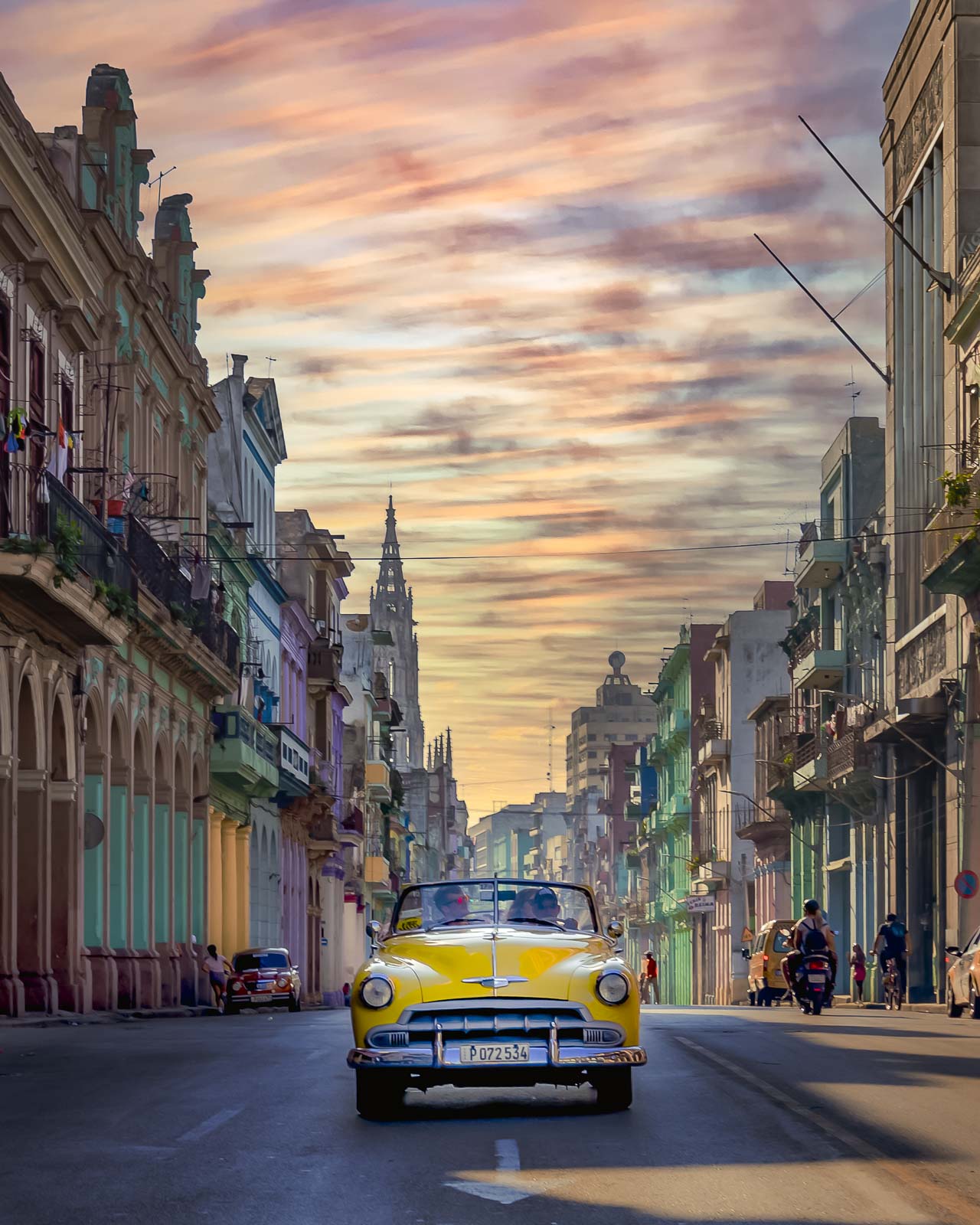 interesting facts about cuba - car driving through world heritage site of Havana