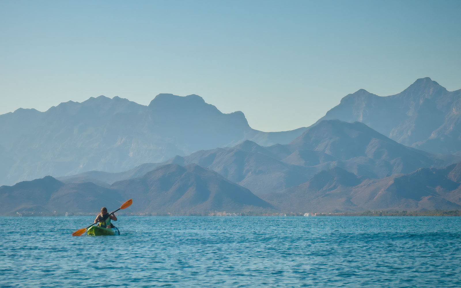 Kayaking with the scenery of Loreto Bay National Marine Park in background