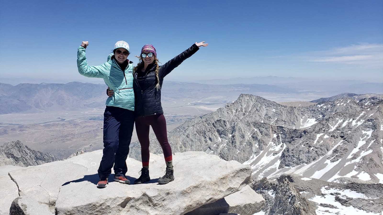 hike with a buddy at the summit of mt whitney