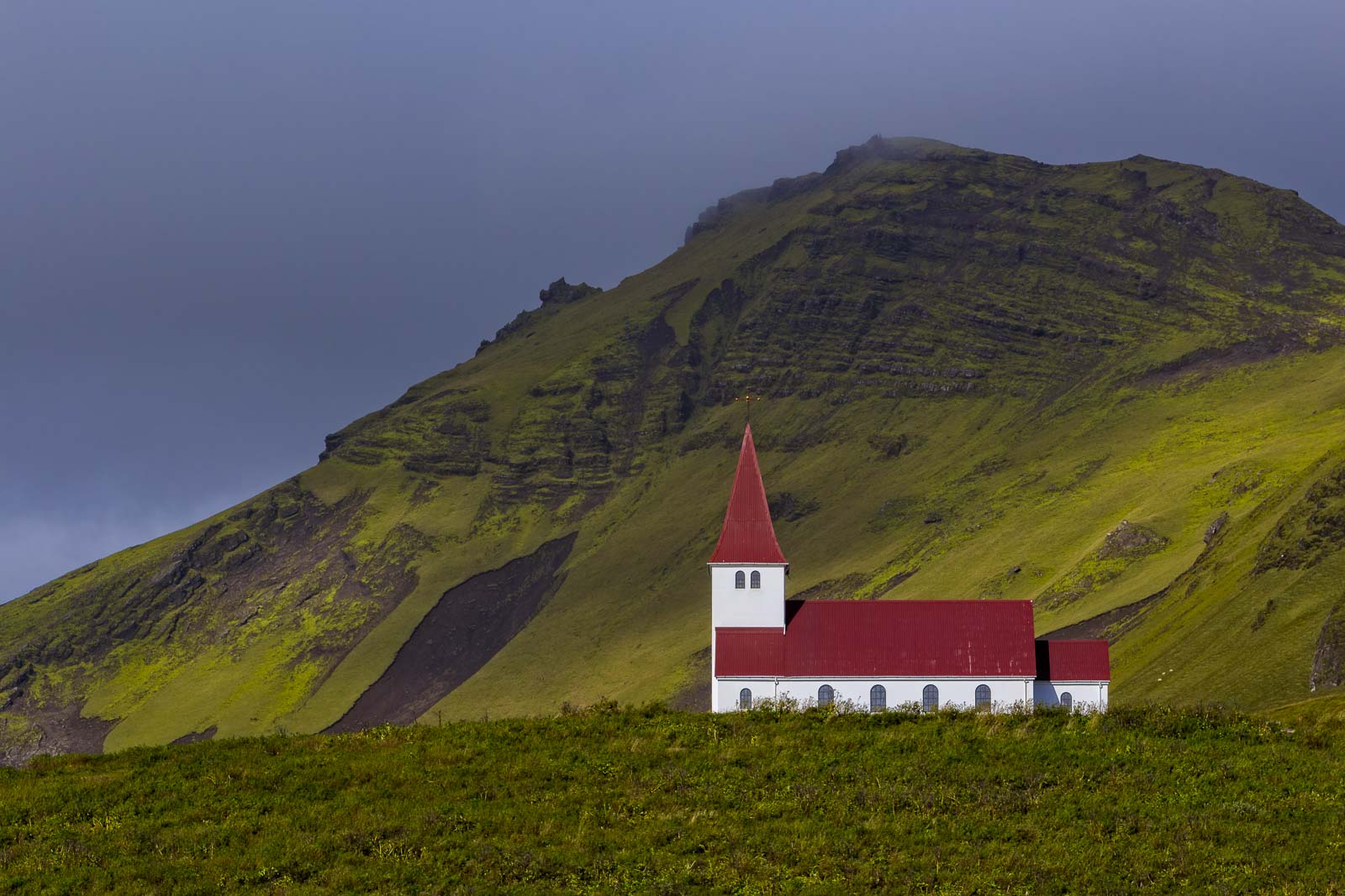 ring road iceland church with mountain. 