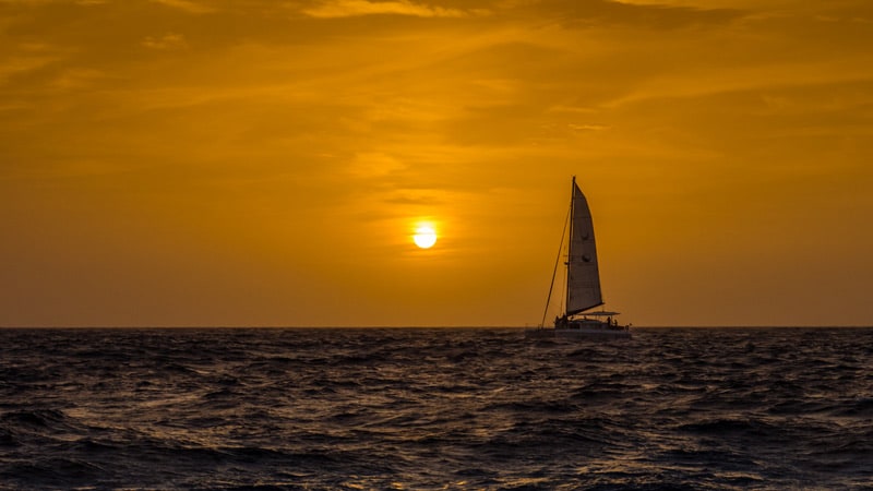 Santorini sail boat at sunset