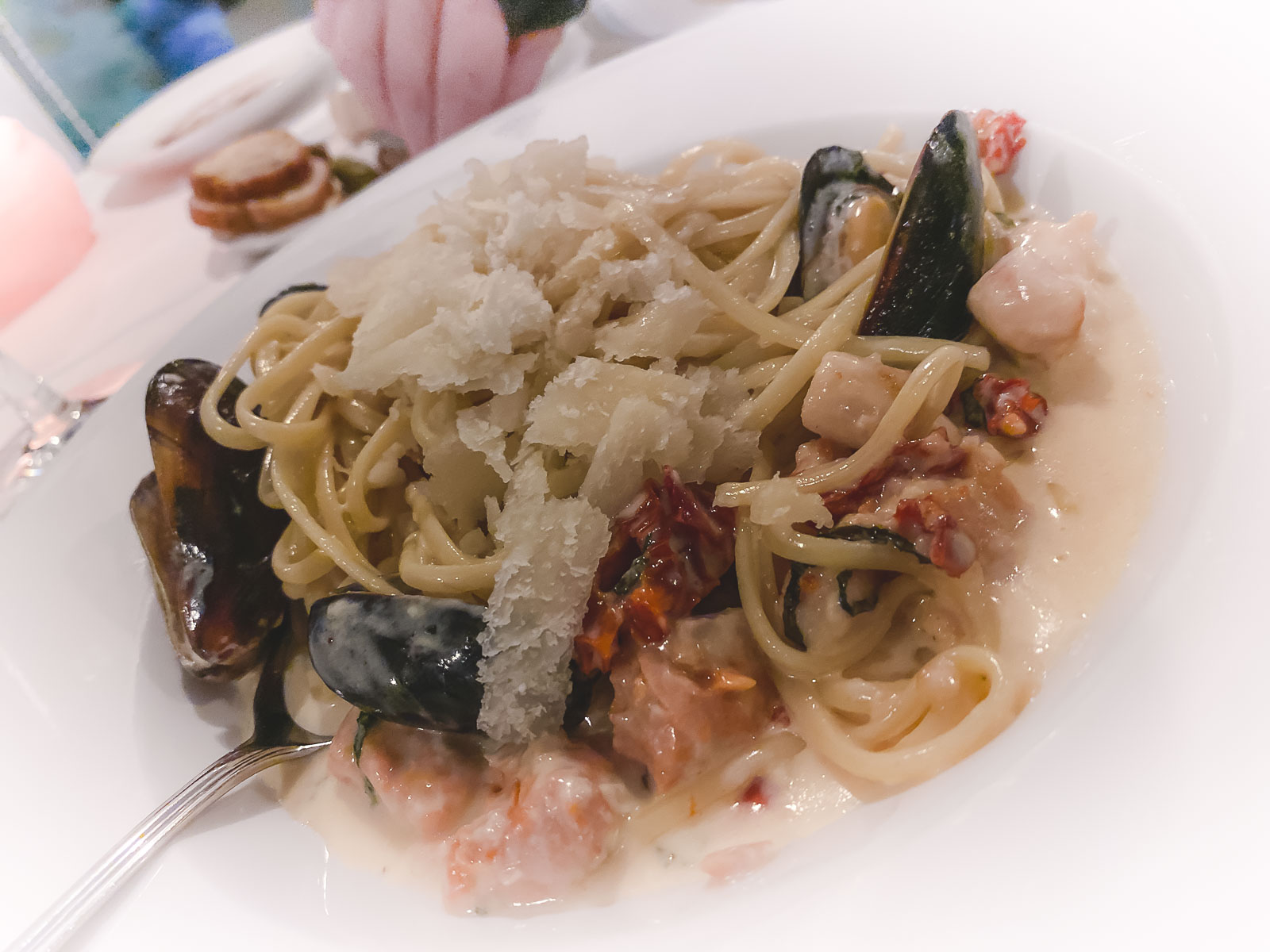 seafood pasta with parmesean cheese, mussels and scallops at lighthouse pub sunshine coast bc