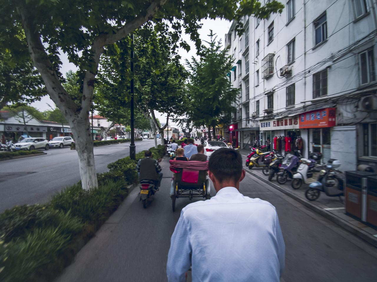 Rickshaw ride through the streets of Suzhou