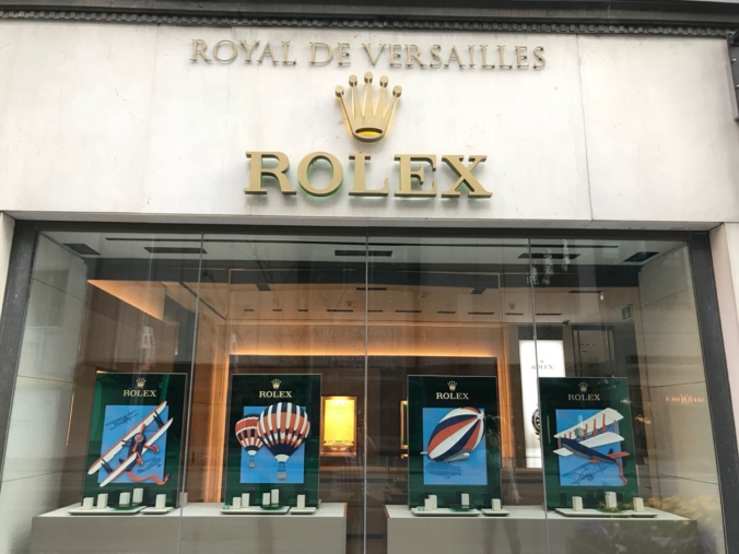 The posh, high-end designer storefronts along a clean, tree-lined street in the luxurious Yorkville neighbourhood.
