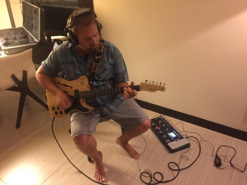 Playing guitar in the Hard Rock Hotel Megopolis in Panama.