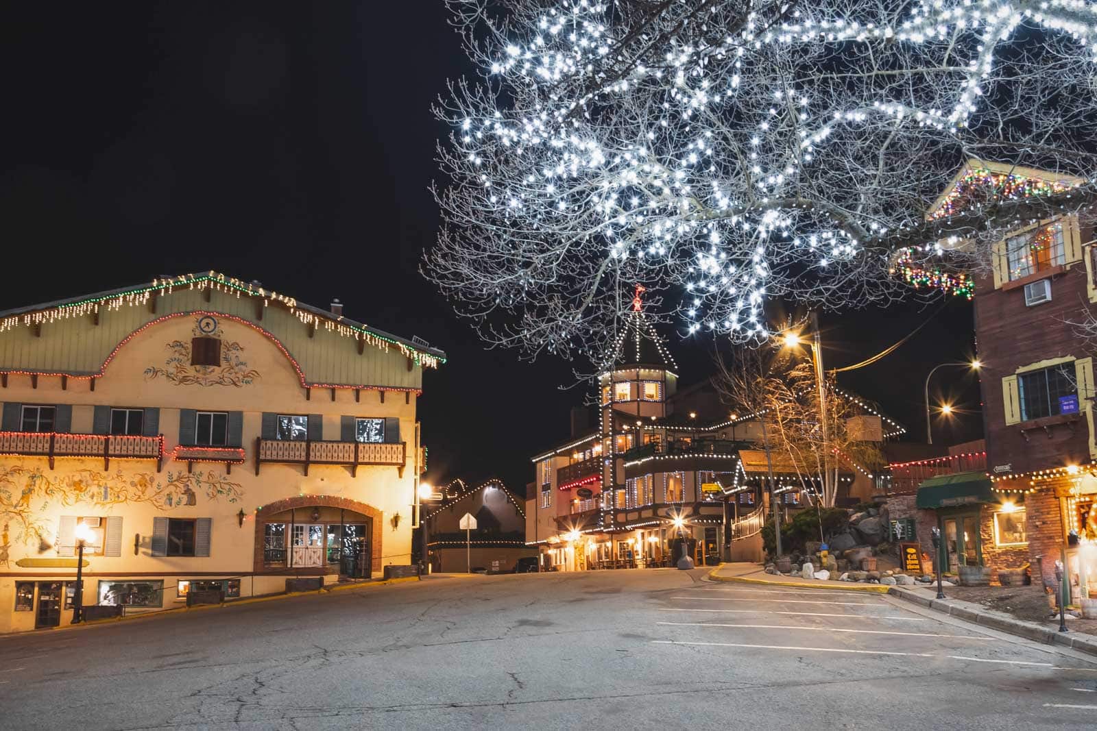 21 Best Places to Visit in December in the USA (2025 Edition) Christmas lights at night in Leavenworth Washington.