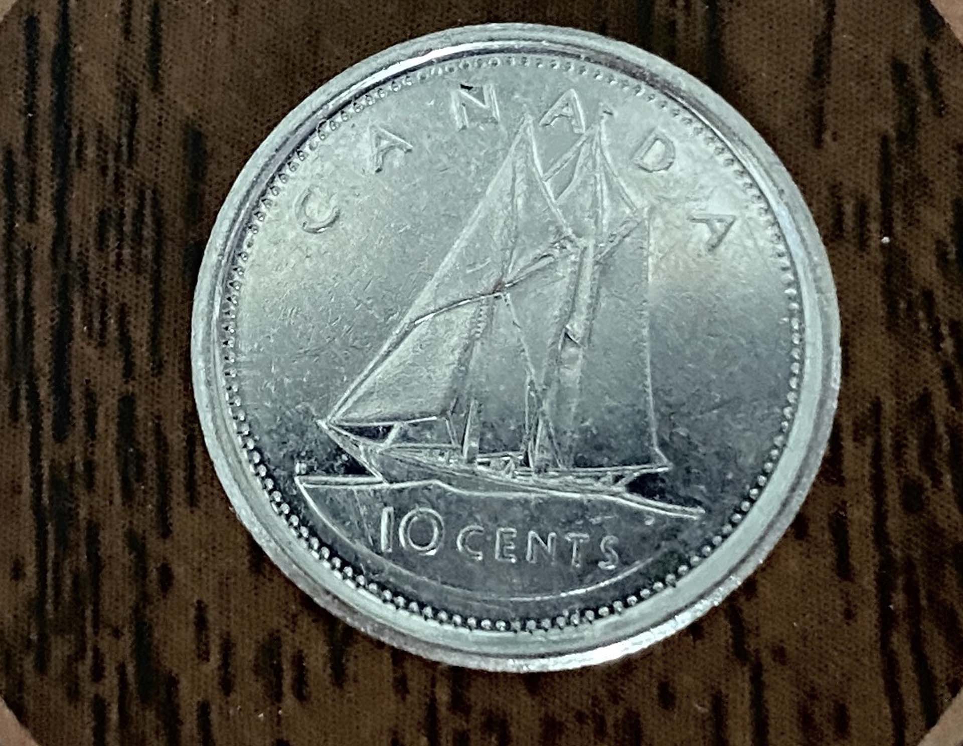 candian dime with bluenose on it. 