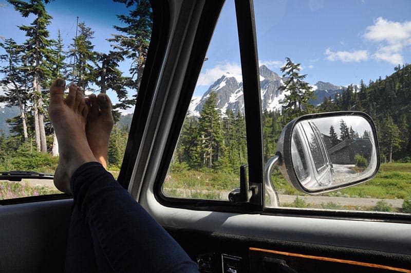 travel in a campervan feet on the dash