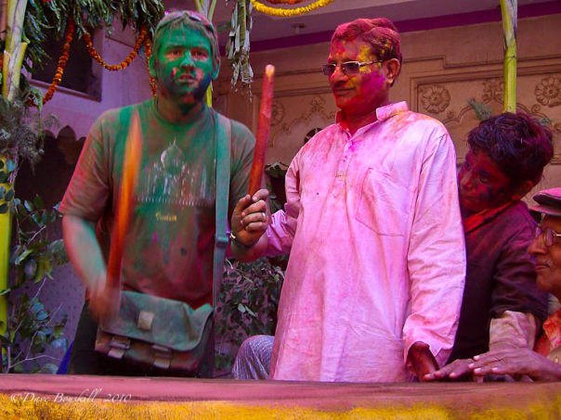 dave drumming during holi celebrations in India