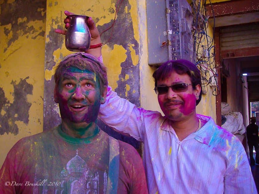 dave with pot on head at holi celebrations