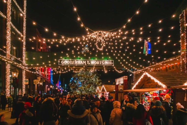 The cobblestone streets of the Distillery District lit up with festive lights during the annual Toronto Christmas Market.