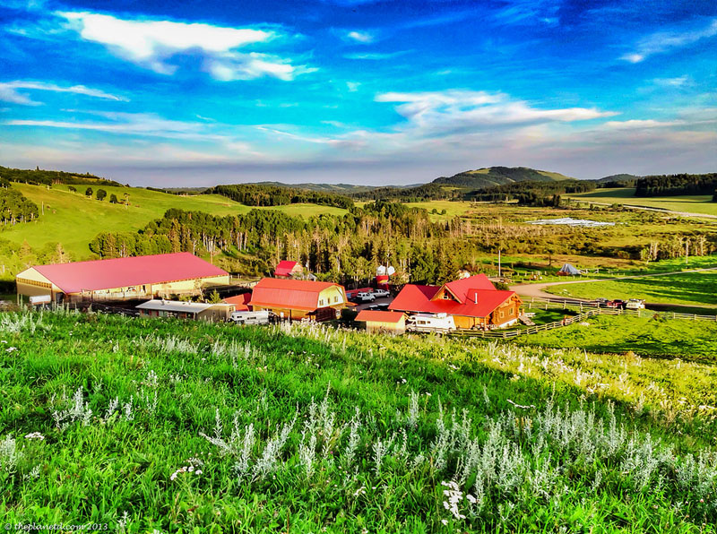 high mountain trail ride view of ranch