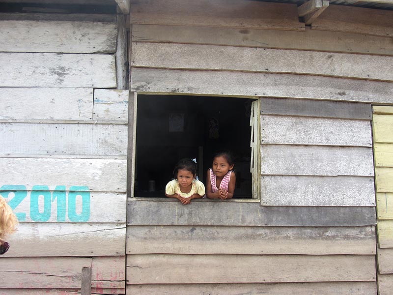 locals on Amazon River Peru