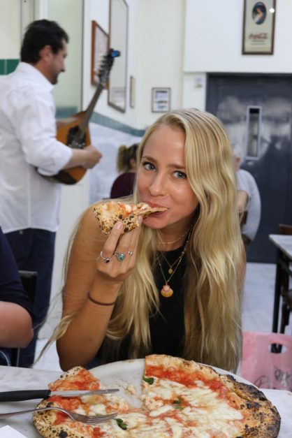 naples italy eating pizza