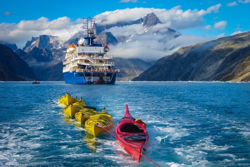 Kayaks being towed to our paddling location in Greenland