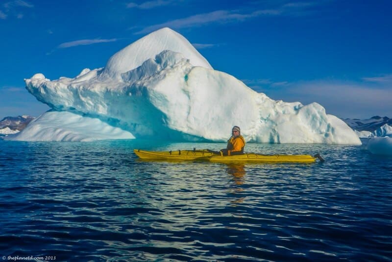 kayaking in Greenland safe distance from iceberg