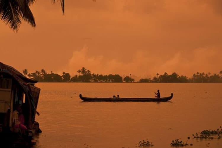 sunset on the kerala backwaters in india