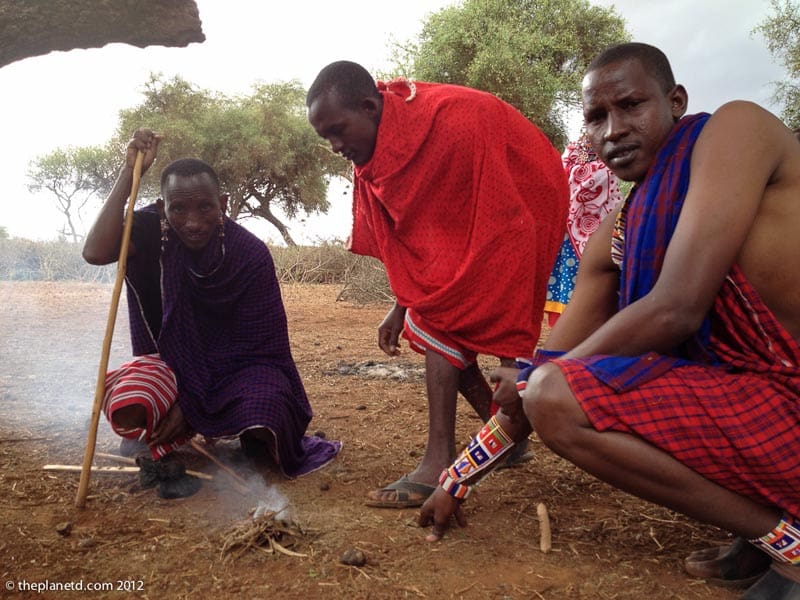 masai men making fire