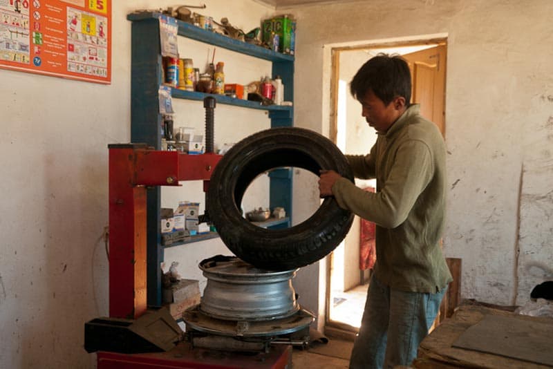 Mongol Rally getting tires fixed