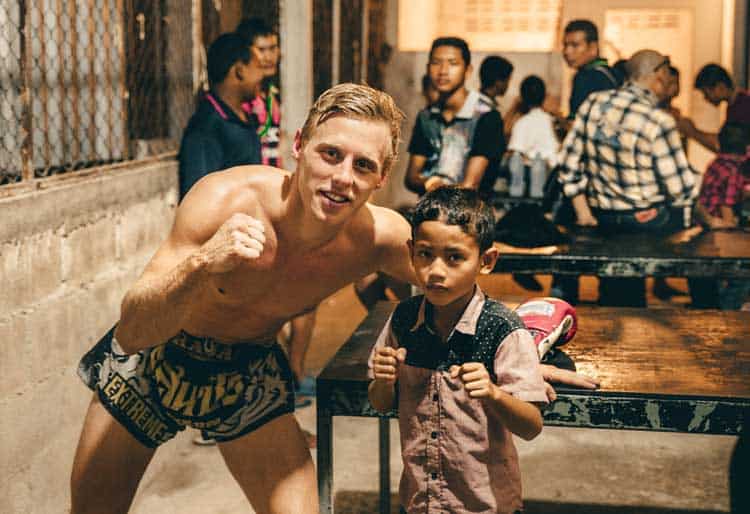 muay thai training in thailand | posing with young boy