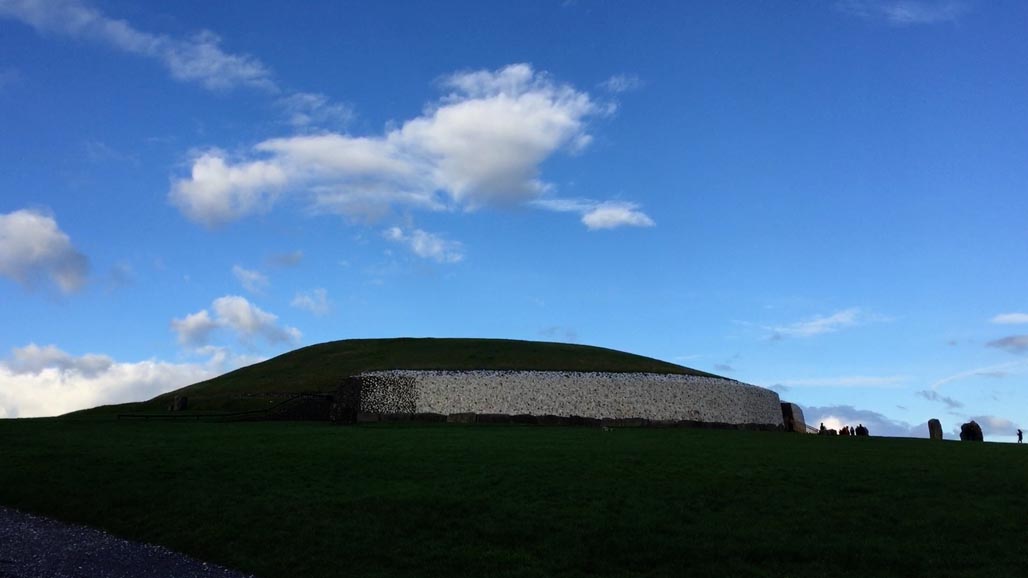 new grange mound surrounded by stone circle