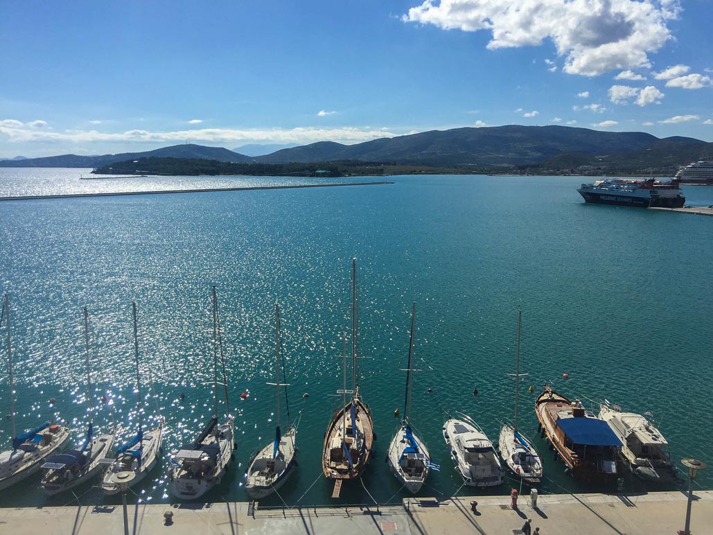 volos greece waterfront boats lined at dock