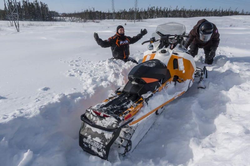 snowmobile quebec stuck in snow
