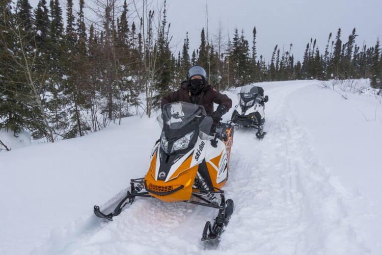 outdoor winter adventures in canada. | snowmobiling