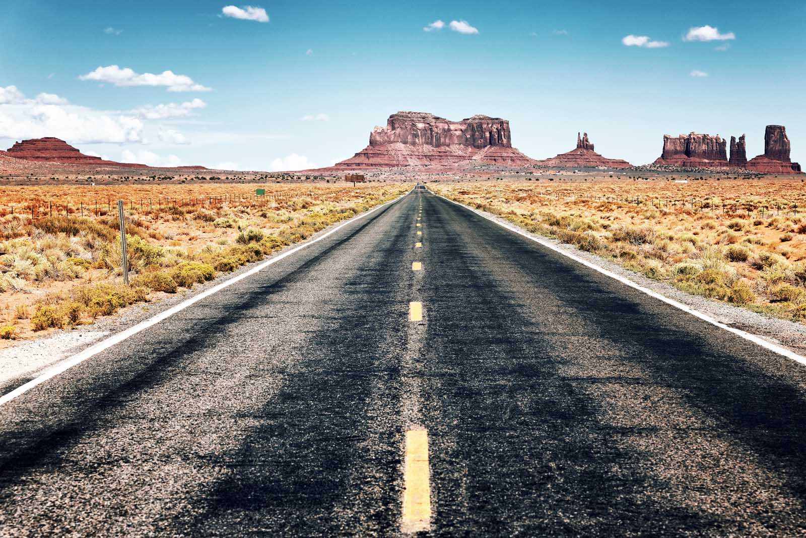 Long road in Monument Valley Utah