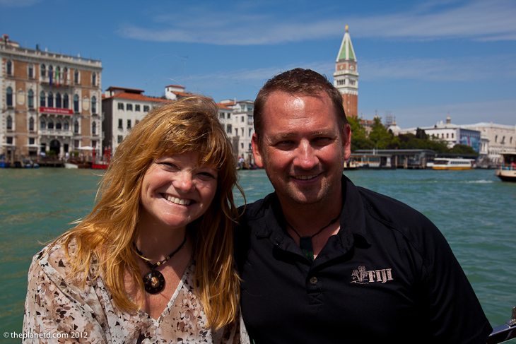 travel Couple on boat tour in Venice Italy