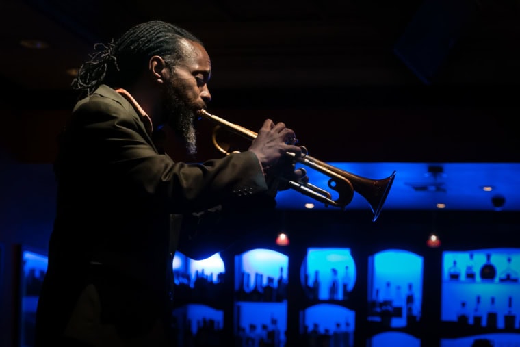 A trumpet player playing Jazz on Frenchman Street in New Orleans