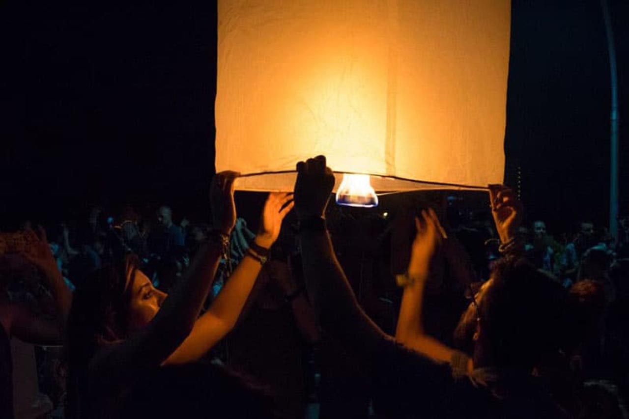 Yi Peng Festival People releasing lanterns in Chiang Mai